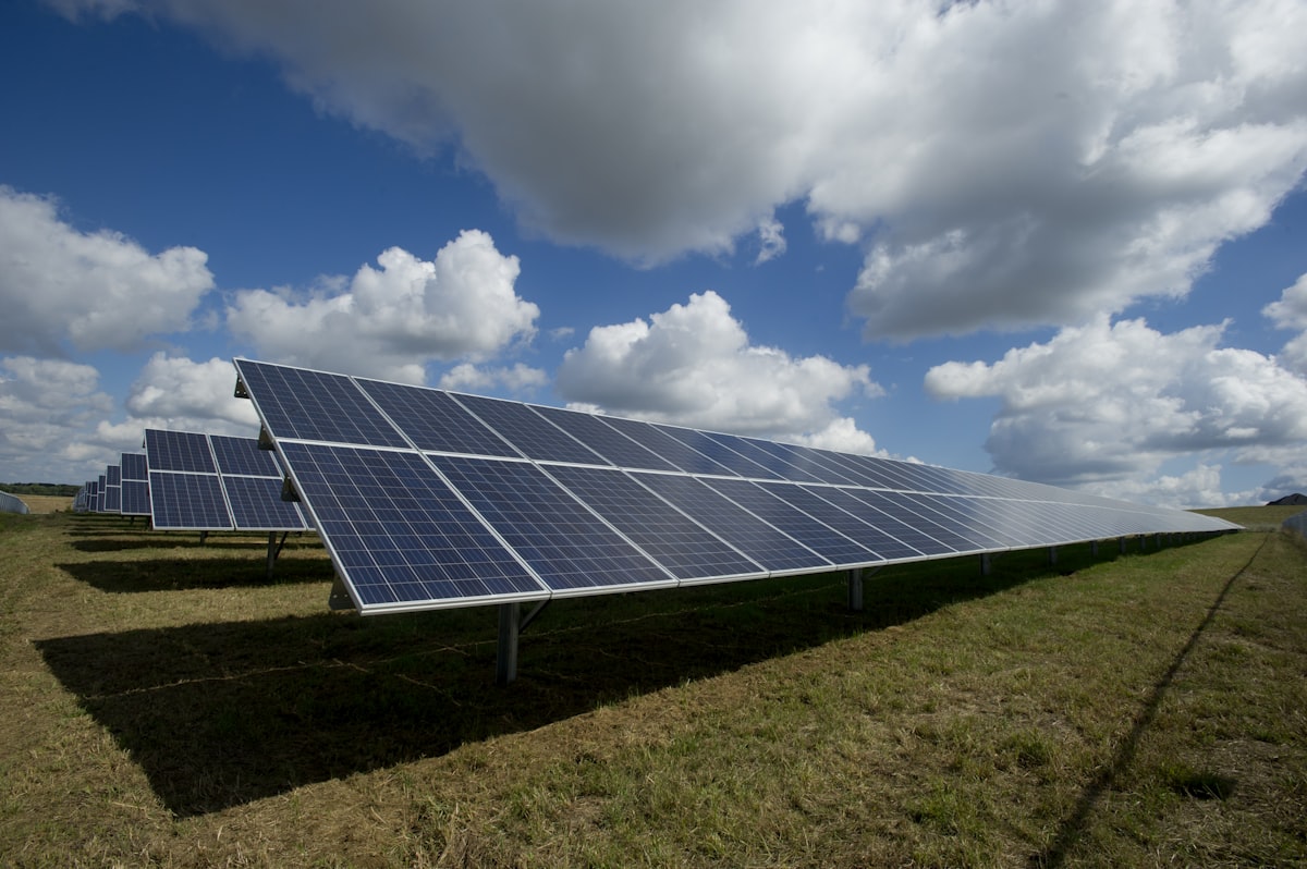 Solar panels and green fields under the Spanish sky